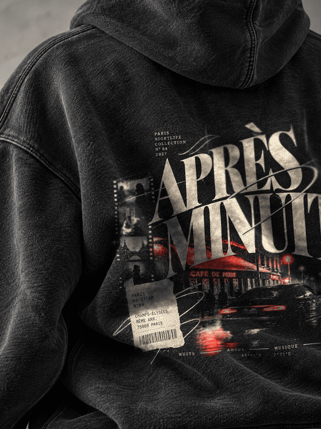 Ryggen af en washed black hoodie med Paris 04 Après Minuit-printet